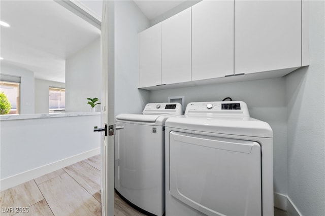 2029 Poppywood Ave, Henderson, NV 89012 - laundry room featuring cabinet space, washer and dryer, wood finished floors, and baseboards