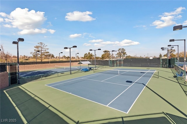 2029 Poppywood Ave, Henderson, NV 89012 - view of tennis court featuring fence and community basketball court