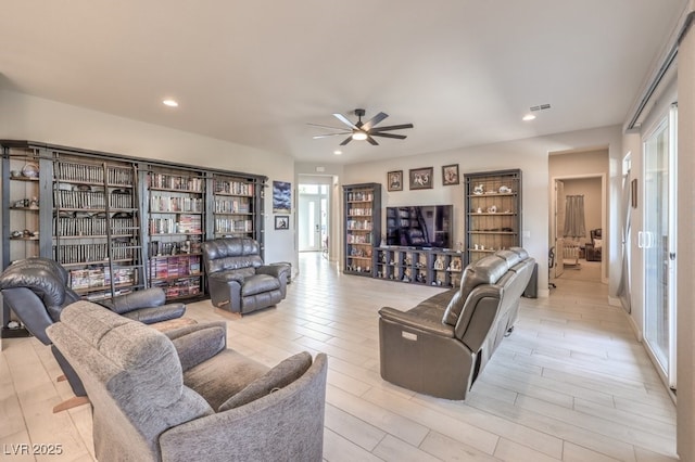 4893 E Cedar Creek Way, Pahrump, NV 89061 - living area featuring ceiling fan, recessed lighting, and light wood-style flooring