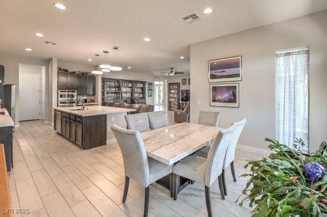 4893 E Cedar Creek Way, Pahrump, NV 89061 - dining room with recessed lighting, a ceiling fan, and baseboards