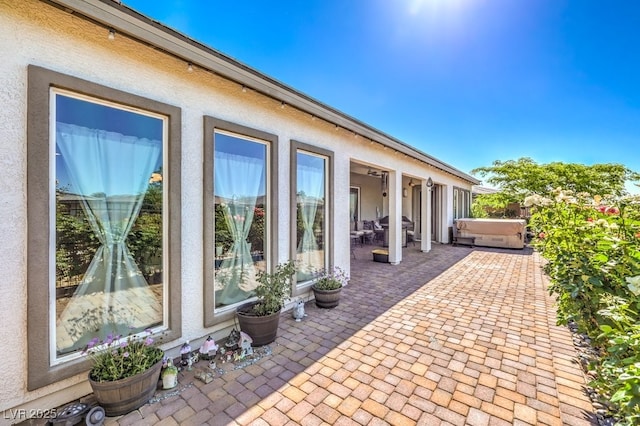 4893 E Cedar Creek Way, Pahrump, NV 89061 - view of patio / terrace featuring a hot tub