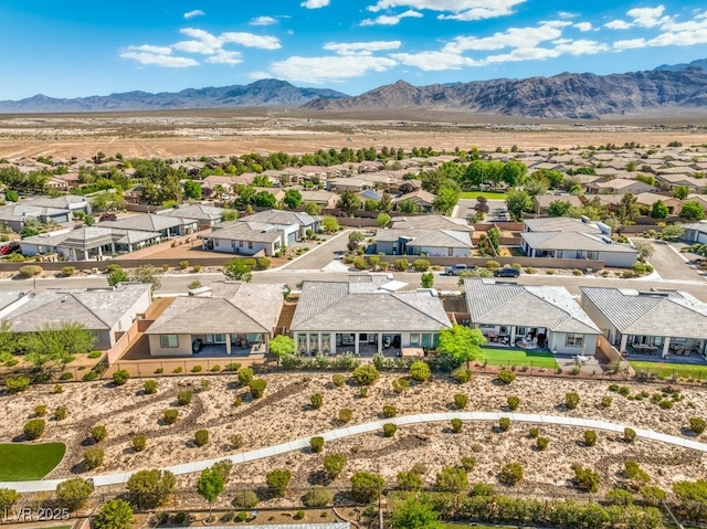 4893 E Cedar Creek Way, Pahrump, NV 89061 - aerial view of residential area featuring a mountainous background