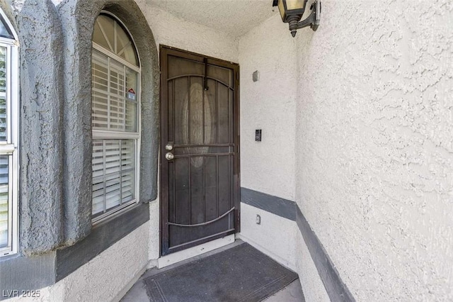 1622 Lorna Dr, Henderson, NV 89011 - view of exterior entry with stucco siding