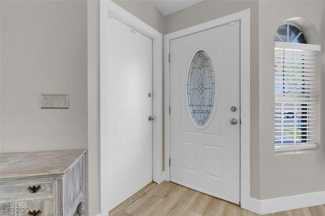 1622 Lorna Dr, Henderson, NV 89011 - foyer entrance with light wood-style flooring