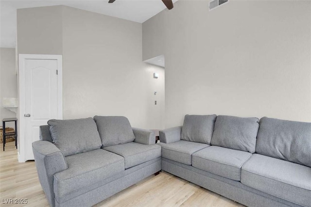 1622 Lorna Dr, Henderson, NV 89011 - living room with light wood finished floors and a ceiling fan