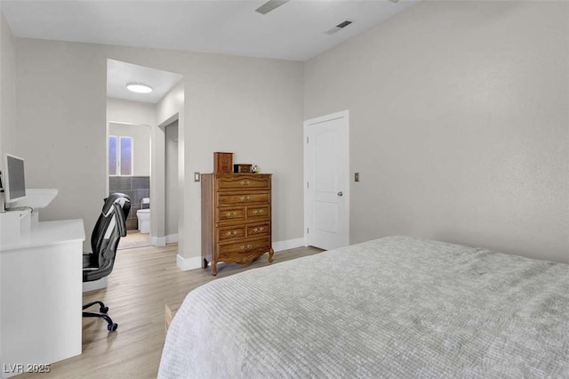 1622 Lorna Dr, Henderson, NV 89011 - bedroom with light wood-style floors, an office area, and baseboards