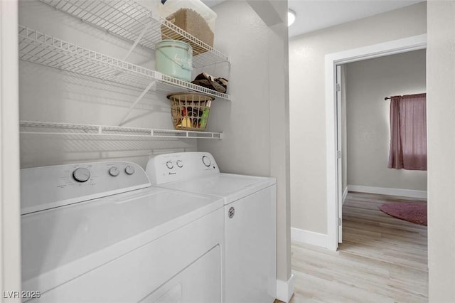 1622 Lorna Dr, Henderson, NV 89011 - laundry room with washer and dryer, baseboards, and light wood-style floors