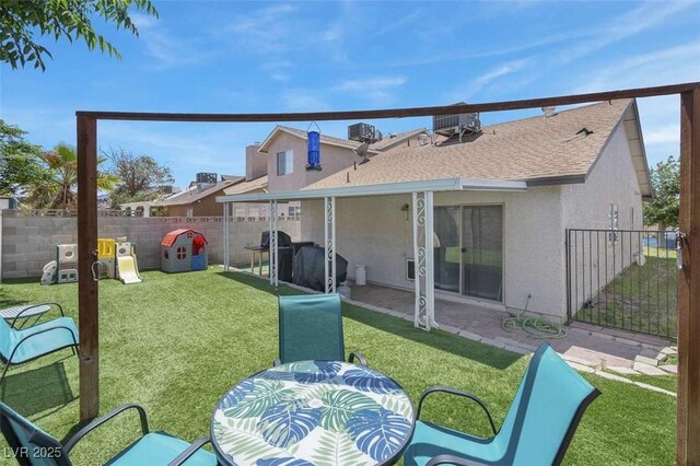 1622 Lorna Dr, Henderson, NV 89011 - back of property featuring stucco siding, a shingled roof, cooling unit, and a patio area