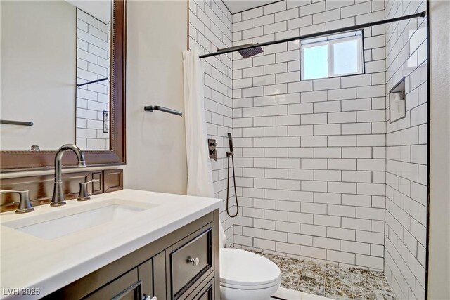 10520 Maystar Ln, Las Vegas, NV 89135 - full bathroom featuring toilet, a stall shower, and vanity