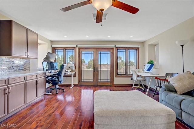 living area featuring french doors, an office area, dark wood finished floors, ceiling fan, and recessed lighting