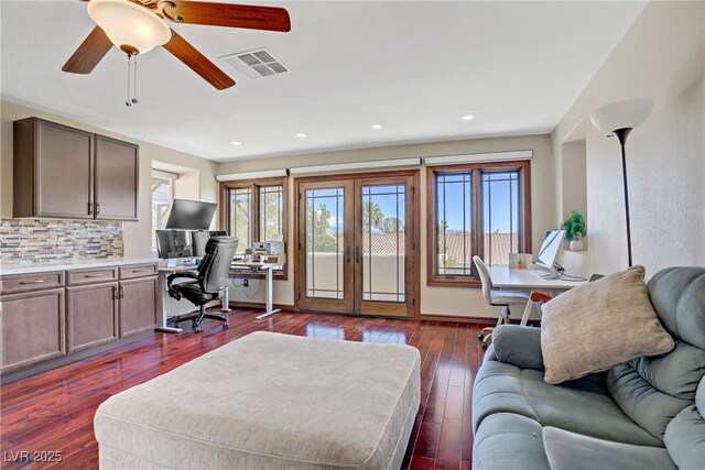 10520 Maystar Ln, Las Vegas, NV 89135 - home office with plenty of natural light, french doors, dark wood finished floors, ceiling fan, and recessed lighting