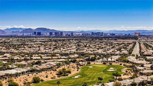 10520 Maystar Ln, Las Vegas, NV 89135 - aerial view of residential area with a mountainous background and a golf club