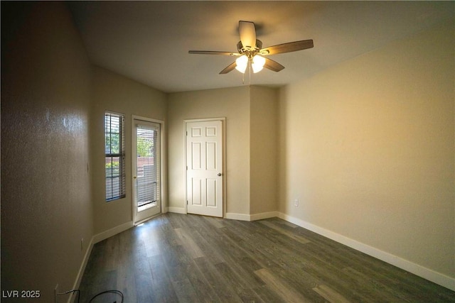 6160 Rumrill St Unit 121, Las Vegas, NV 89113 - spare room featuring ceiling fan, dark wood-type flooring, and baseboards