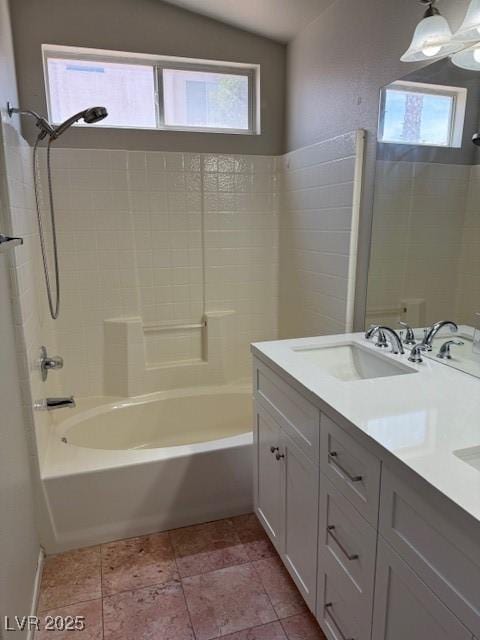 bathroom with lofted ceiling,  shower combination, and double vanity