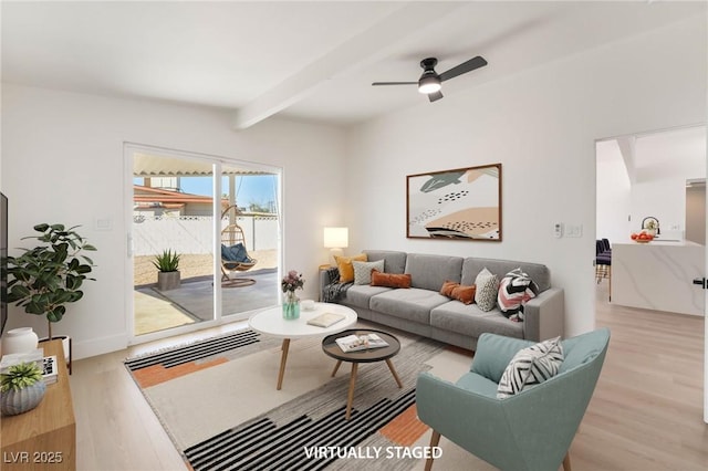 6205 Hargrove Ave, Las Vegas, NV 89107 - living room featuring light wood finished floors, beam ceiling, and ceiling fan
