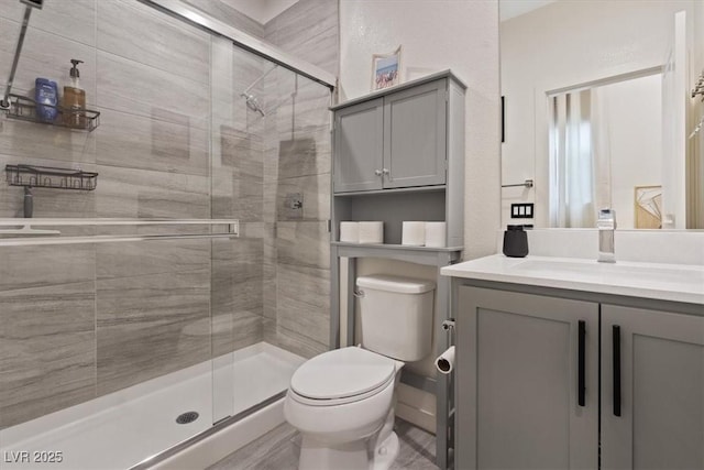 9710 Hiking Ave, Las Vegas, NV 89166 - bathroom with toilet, vanity, and a stall shower