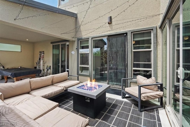 9710 Hiking Ave, Las Vegas, NV 89166 - view of patio / terrace featuring an outdoor living space with a fire pit