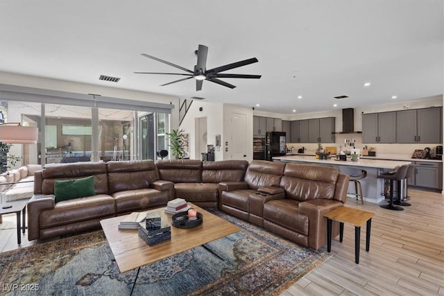 9710 Hiking Ave, Las Vegas, NV 89166 - living area with ceiling fan, recessed lighting, and light wood finished floors