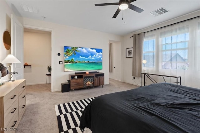 9710 Hiking Ave, Las Vegas, NV 89166 - bedroom with light carpet, baseboards, and a ceiling fan