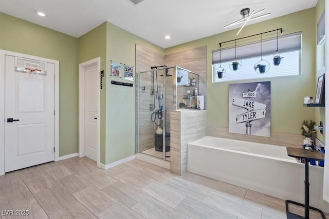 9710 Hiking Ave, Las Vegas, NV 89166 - bathroom with a garden tub and a shower stall