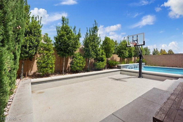 9710 Hiking Ave, Las Vegas, NV 89166 - view of sport court featuring a fenced backyard