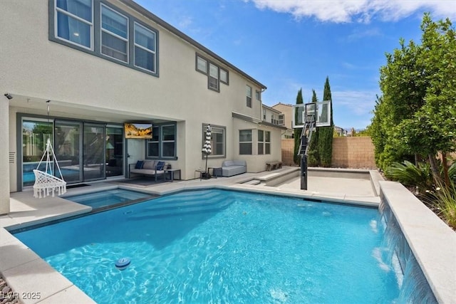 9710 Hiking Ave, Las Vegas, NV 89166 - view of swimming pool with a patio and a pool with connected hot tub