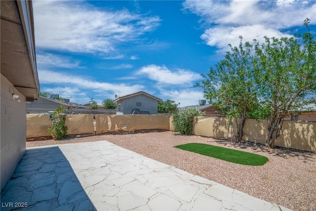 view of patio featuring a fenced backyard