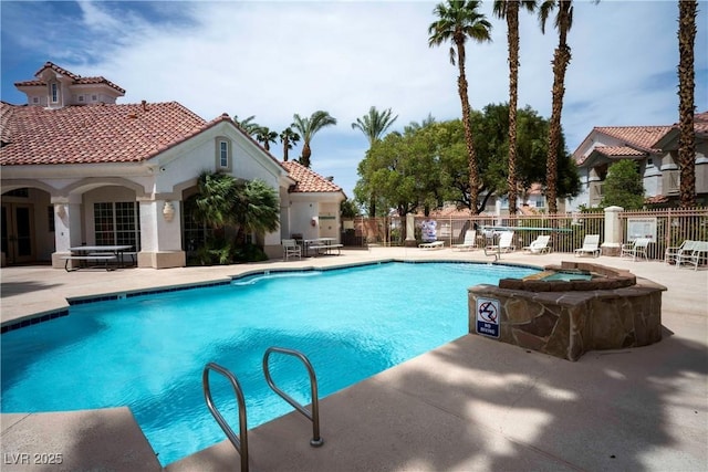 8555 W Russell Rd Unit 2020, Las Vegas, NV 89113 - community pool featuring fence and a patio