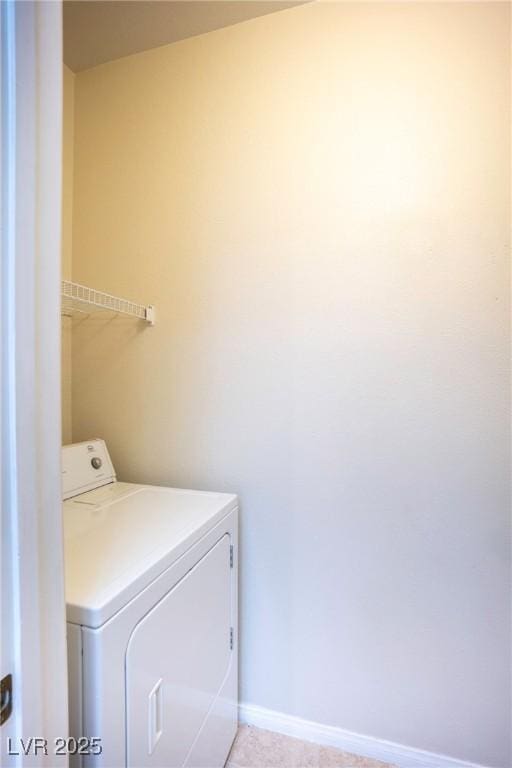 8555 W Russell Rd Unit 2020, Las Vegas, NV 89113 - laundry area with washer / clothes dryer and baseboards