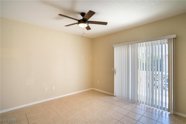 8555 W Russell Rd Unit 2020, Las Vegas, NV 89113 - spare room with a ceiling fan, baseboards, and light tile patterned floors