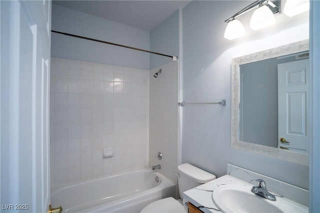 8555 W Russell Rd Unit 2020, Las Vegas, NV 89113 - bathroom featuring toilet, shower / bath combination, and vanity