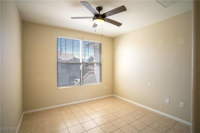 8555 W Russell Rd Unit 2020, Las Vegas, NV 89113 - empty room with ceiling fan, baseboards, and light tile patterned floors
