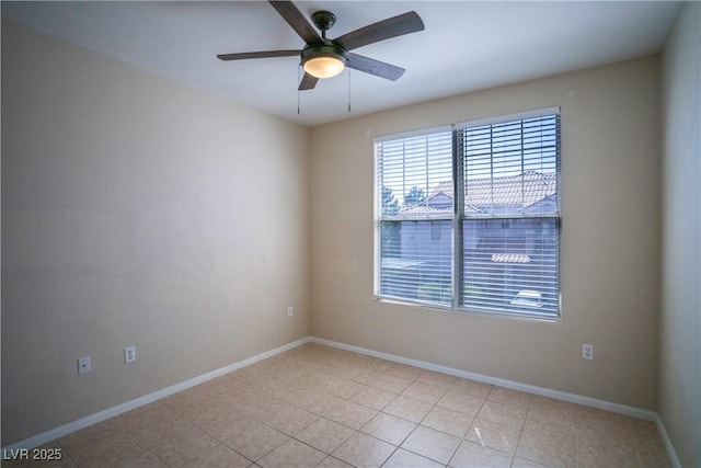 8555 W Russell Rd Unit 2020, Las Vegas, NV 89113 - spare room with healthy amount of natural light, a ceiling fan, and baseboards