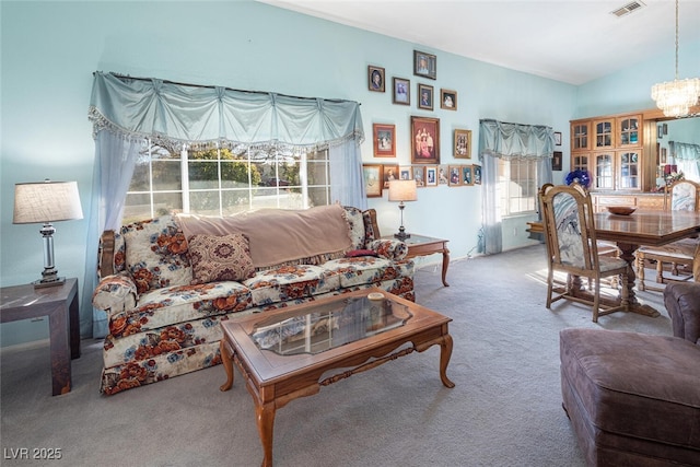 10140 W Tropical Pkwy, Las Vegas, NV 89149 - living area with carpet flooring and a chandelier