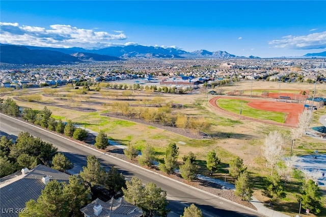 aerial perspective of suburban area featuring a mountain backdrop