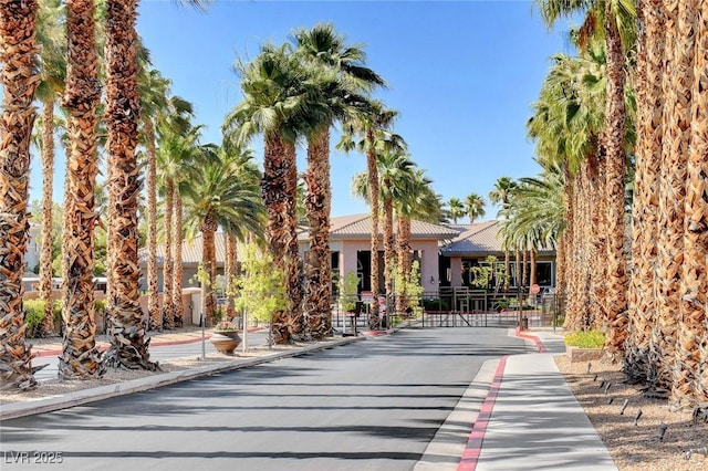 view of property's community with a gate