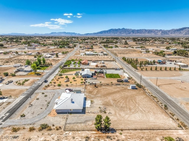 1410 Tiptop Trl, Pahrump, NV 89048 - aerial view of sparsely populated area featuring a mountainous background and a desert landscape
