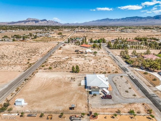1410 Tiptop Trl, Pahrump, NV 89048 - aerial view of sparsely populated area featuring a desert landscape and a mountain backdrop