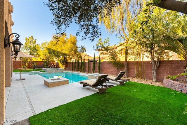 10002 Trapper Mountain St, Las Vegas, NV 89178 - view of swimming pool featuring a patio area and a pool with connected hot tub