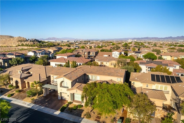 10002 Trapper Mountain St, Las Vegas, NV 89178 - aerial perspective of suburban area with a mountain backdrop