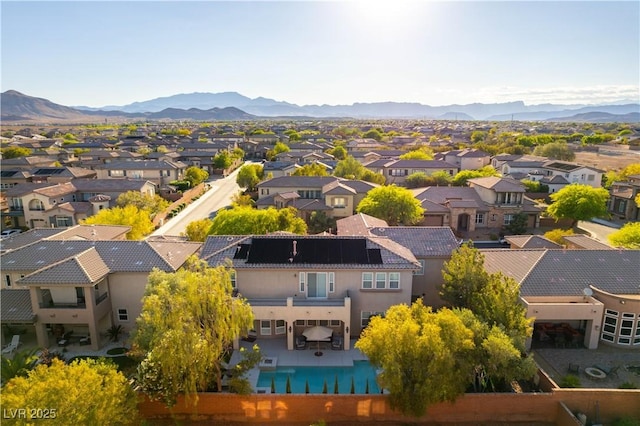 10002 Trapper Mountain St, Las Vegas, NV 89178 - aerial perspective of suburban area with a mountainous background