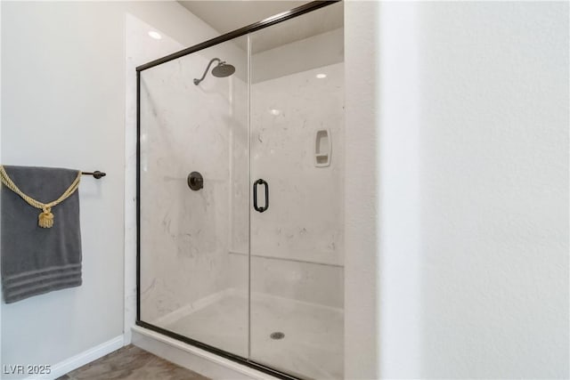 8275 Old Creek Ranch St, Las Vegas, NV 89139 - bathroom featuring a marble finish shower and baseboards