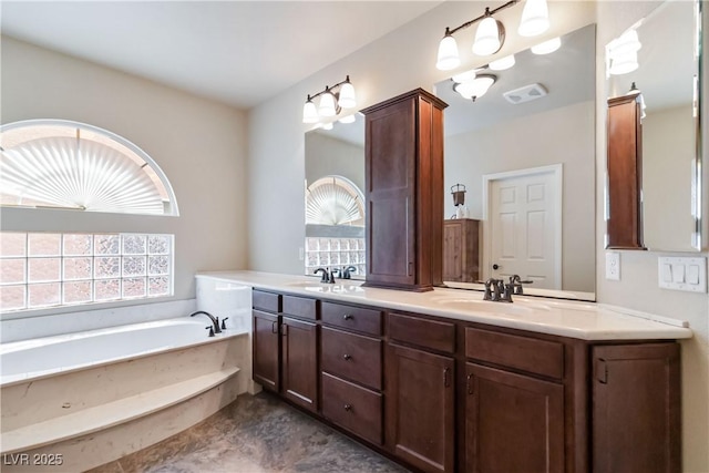 8275 Old Creek Ranch St, Las Vegas, NV 89139 - bathroom with double vanity and a bath