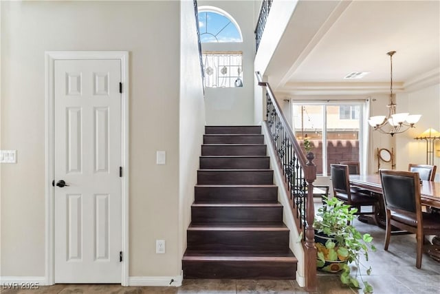 8275 Old Creek Ranch St, Las Vegas, NV 89139 - staircase featuring a chandelier and baseboards