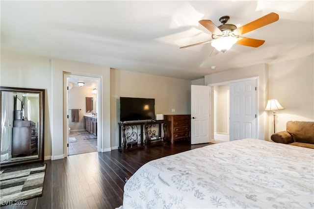 8275 Old Creek Ranch St, Las Vegas, NV 89139 - bedroom featuring dark wood-style floors, baseboards, a ceiling fan, and ensuite bath