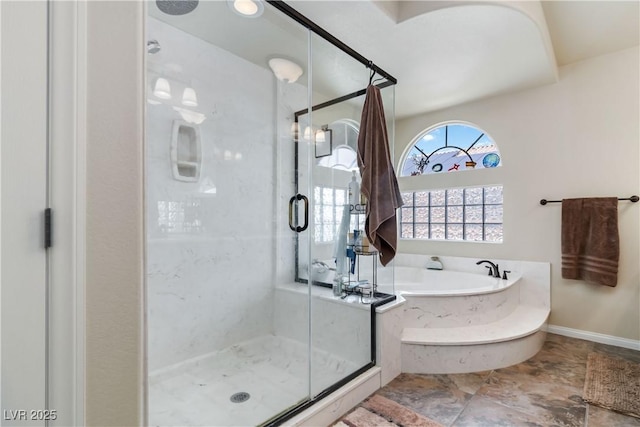 8275 Old Creek Ranch St, Las Vegas, NV 89139 - bathroom with a bath, a shower stall, and baseboards
