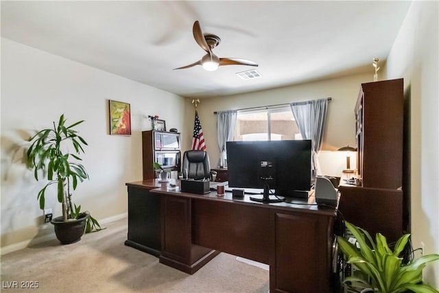 8275 Old Creek Ranch St, Las Vegas, NV 89139 - home office with a ceiling fan, light colored carpet, and baseboards