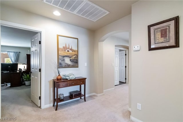 8275 Old Creek Ranch St, Las Vegas, NV 89139 - hall with arched walkways, light carpet, baseboards, an office area, and recessed lighting
