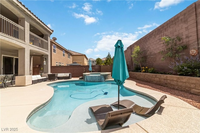 8275 Old Creek Ranch St, Las Vegas, NV 89139 - view of swimming pool featuring a fenced backyard, a patio area, a pool with connected hot tub, and outdoor lounge area