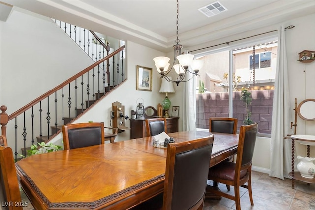 8275 Old Creek Ranch St, Las Vegas, NV 89139 - dining space featuring a chandelier and stairway